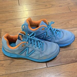 Women’s size 11 New Balance 512 athletic shoes